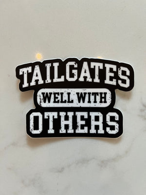 Tailgates Well with Others Sticker
